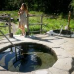 woman standing near spiral tubs