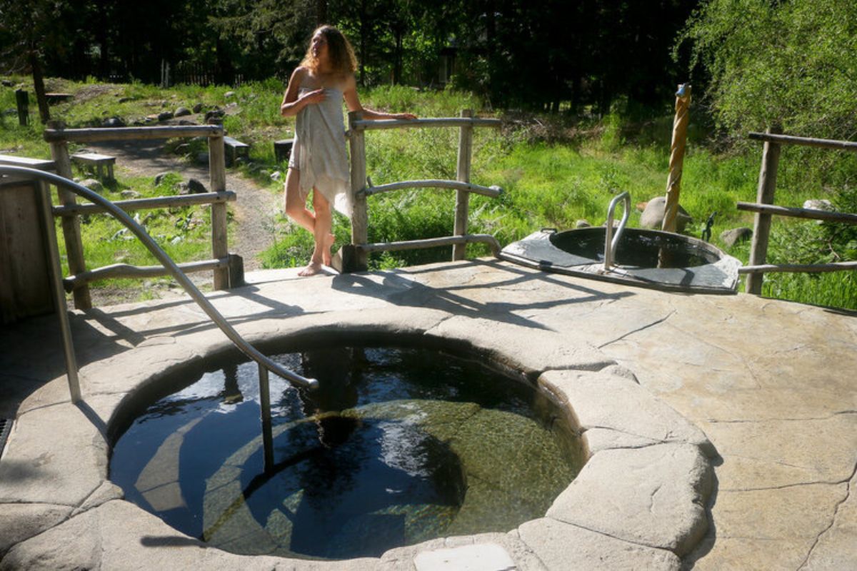 woman standing near spiral tubs