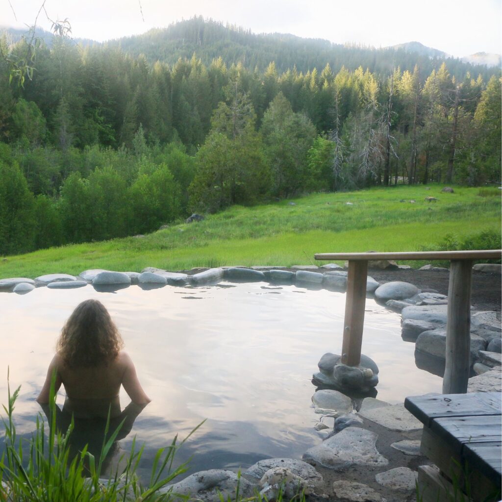 woman in a meadow hot springs