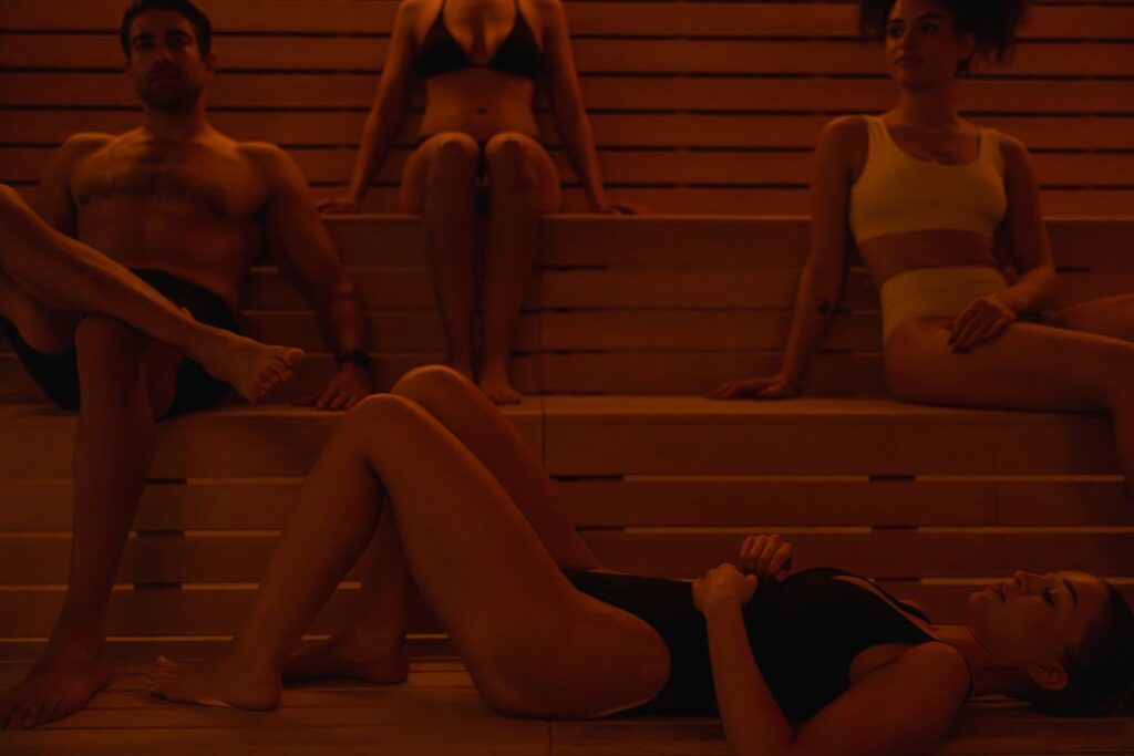 people lounging in a sauna